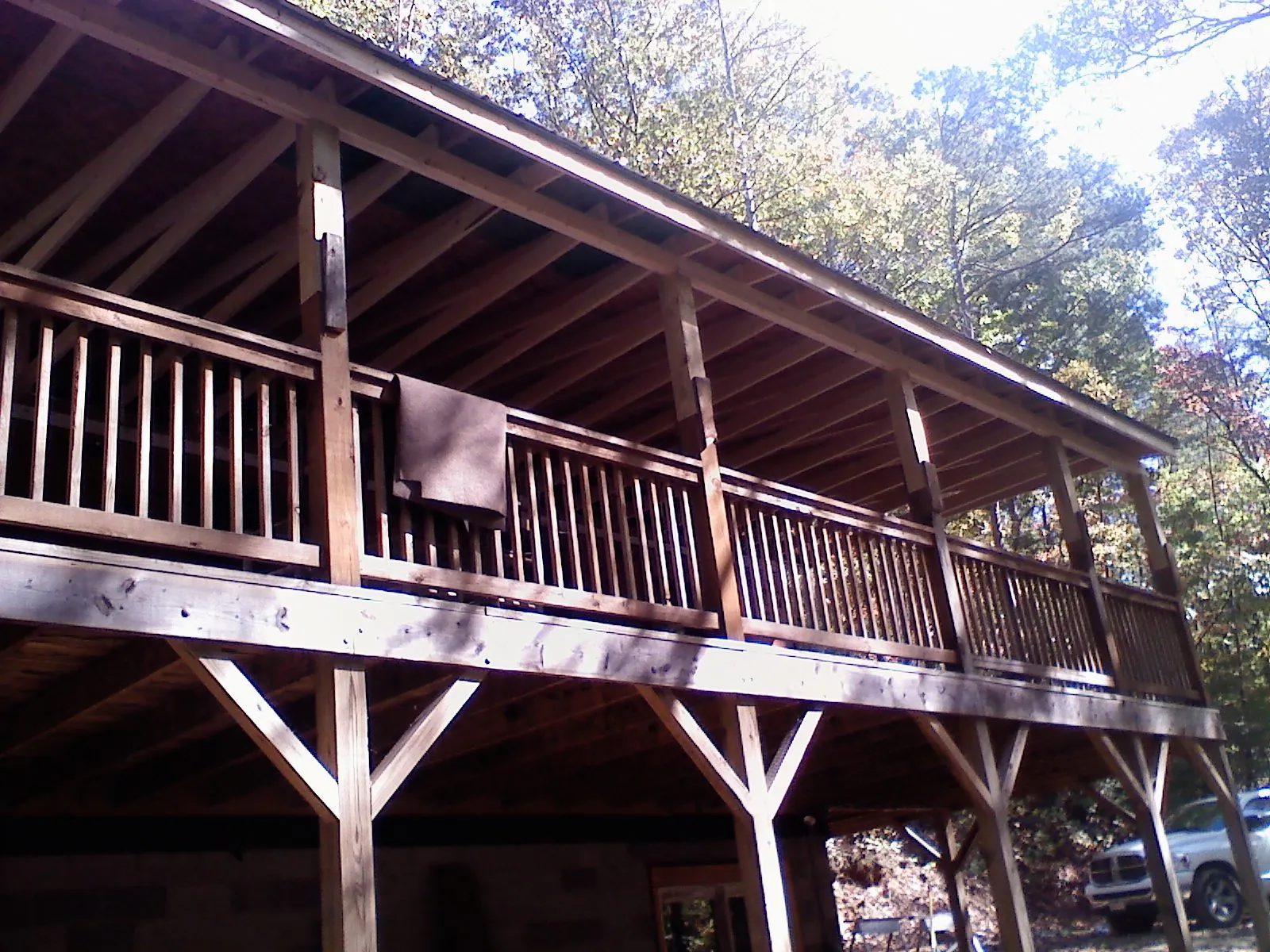 Timber framing under a new elevated porch and deck — Roof Leak Repair in Ghent by Roofing Brothers